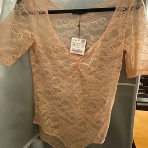 Zara blush lace body suit